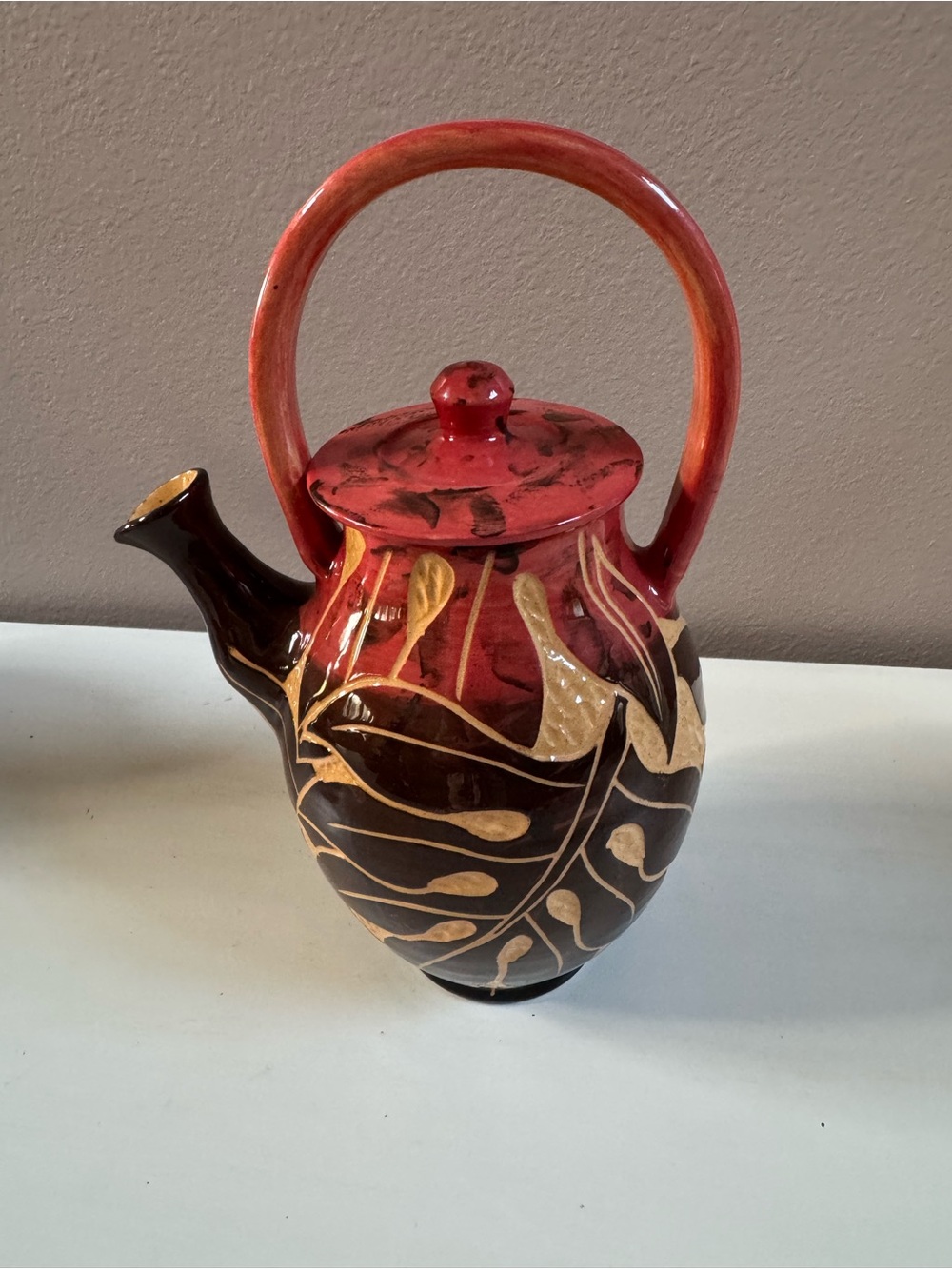 Wassi Art Pottery Works “monkey pot” teapot from Jamaica
